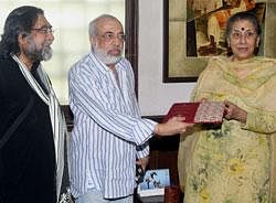 Stars and awards: Information and Broadcasting Minister Ambika Soni receiving the results and recommendations for the 58th National Film Awards from the Chairman of Feature Films J P Dutta along with jury member Prahlad Kakkar, in New Delhi on Thursday. PTI