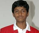 Prudhvi Teja, who has topped IIT-JEE examination 2011, poses for a photo in Hyderabad on Wednesday. PTI Photo