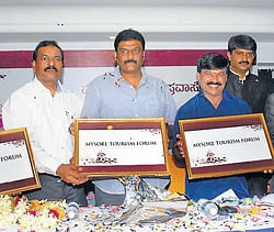 United front: Tourism minister Anand Singh (fourth from left) launches Mysore Tourism Forum in Mysore on  Wednesday. (L-R) Deputy mayor Mahadevappa, mayor M&#8200;C&#8200;Rajeshwari, hotelier M&#8200;Rajendra, minister&#8200;S&#8200;A&#8200;Ramdas, travel operator B&#8200;S&#8200;Prashanth, deputy commisioner P&#8200;S&#8200;Vastrad and police commissioner K&#8200;L&#8200;Sudheer are seen. DH Photo