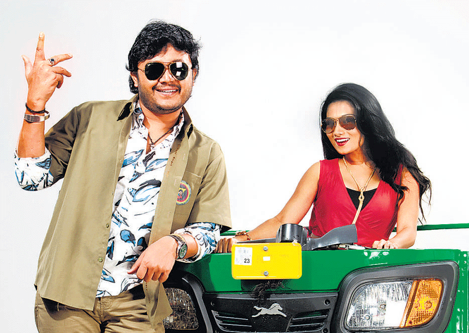 Different: Ganesh and Deepika in 'Auto Raja'.