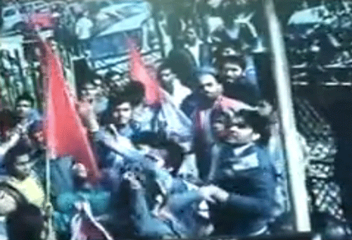 A TV grab of Hindu activists vandalising Aam Aadmi Party office at Kaushambi.