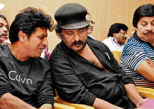 Actors Shivarajkumar, Ravichandran and Srinath during a meeting on dubbing of other  language films into Kannada, in the City on Sunday. KPN