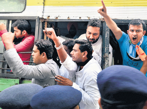 THROTTLING FREEDOM: Police detain NSUI activists during a protest outside the residence ofHRDMinister Smriti Irani in New Delhi on Friday over the ban on an IIT-Madras students group for criticising Prime Minister Narendra Modi. PTI