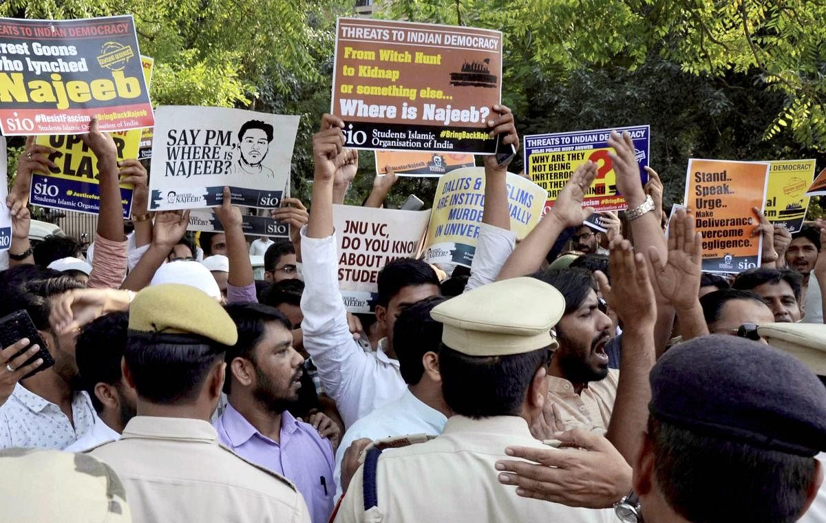 Police stop the members of Students Islamic Organisation of India during a protest for the missing JNU student Najeeb, near CBI, in New Delhi. PTI File Photo