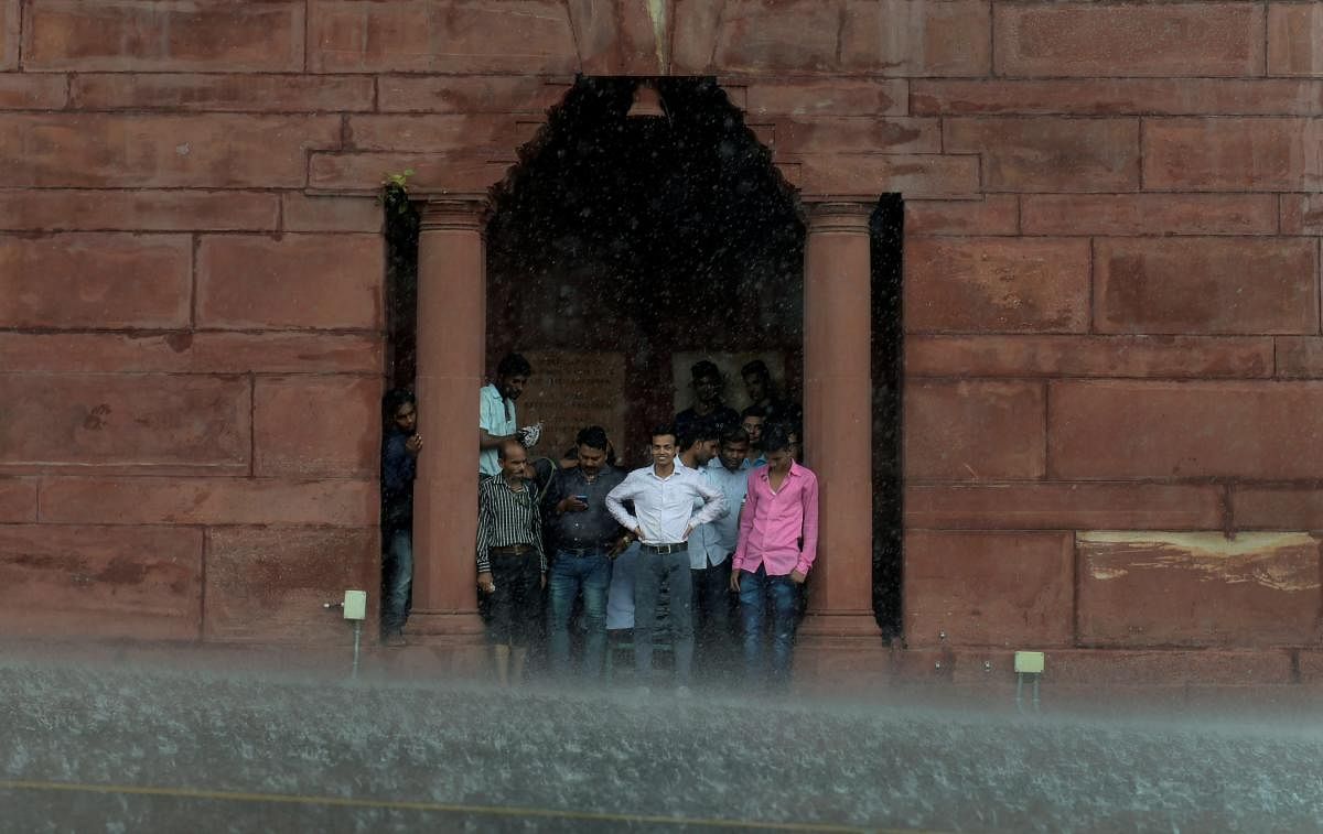 The south-west monsoon hit New Delhi this week with light rain on Monday and heavy showers on Thursday, bringing respite not only from the scorching heat but also from the pollution which had peaked to unexpected levels this month. (PTI Photo)