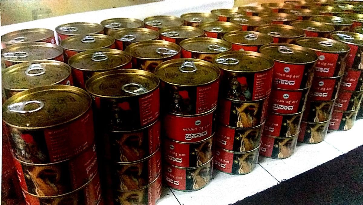 Prasadam packed in tin-free steel cans.