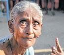 A senior voter at a polling booth in Bellary on Wednesday. kpn