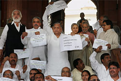 Samajwadi Party President Mulayam Singh along with TDP and the Left front leaders staging a dharna at Parliament house in New Delhi on Friday. The protest was organised to demand restoration of normalcy in Parliament and a debate on the coal block allocation issue. PTI