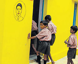 Government Lower Primary School at Koragandahalli in Kolar taluk boasts of well-tiles floors and excellent toilets. DH Photos