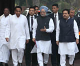 ndian Prime Minister Manmohan Singh (C) arrives at the Parliament House to attend the winter session of parliament in New Delhi on November 22, 2012. India's shaky government and the opposition locked horns on Thursday as parliament re-opened for a crucial session that will see a recent string of pro-market reforms being hotly contested. AFP