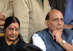 India's main opposition Bharatiya Janata Party (BJP) President Rajnath Singh (L) and leader of the opposition party Sushma Swaraj attend a BJP protest demanding Indian Home Minister Sushilkumar Shinde's resignation for alleging that the BJP and The Rashtriya Swayamsevak Sangh (RSS) were behind attacks on non-Hindus during a protest in New Delhi on January 27, 2013. BJP leaders have demanded the resignation of Mr Shinde for the comments and they want an apology from the congress led government. AFP