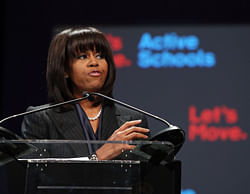 First lady Michelle Obama speaks about a school exercise program in Chicago, Illinois. Obama unveiled a new initiative called 'Let's Move Active Schools' to help schools create a physical activity programs for students. AFP photo