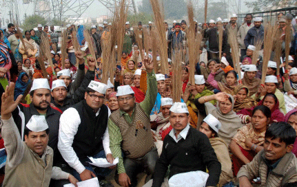 Aam Admi Party (AAP) members sit on dharna over Electricity bill issue in Faridabad. PTI photo
