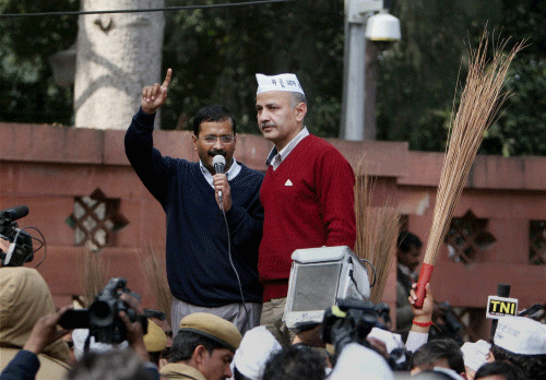 File photo of Delhi Chief Minister Arvind Kejriwal with his cabinet colleague Manish Sisodia addresses the media and supporters during his dharna demanding action against police personnel for their alleged dereliction of duty near Rail Bhavan in New Delhi. PTI