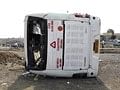 Tragedy: The Volvo bus that overturned on the Pune-Bangalore national highway in Belgaum on Thursday. DH photo