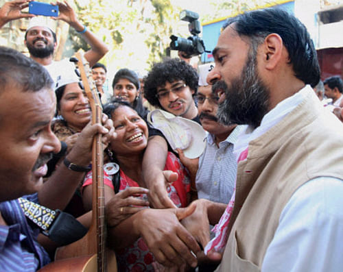 Aam Aadmi Party (AAP) leader Yogendra Yadav interacts with party workers in Mumbai on Tuesday. PTI Photo