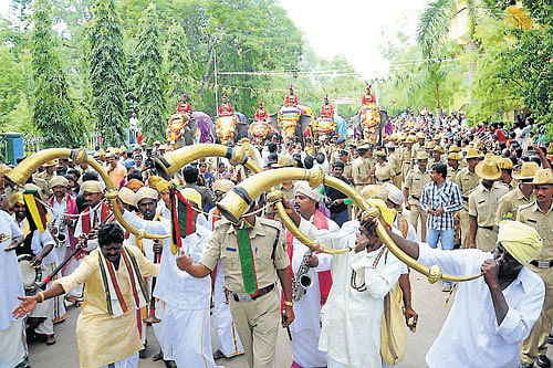 grand beginning: Cultural troupes perform during the welcome ceremony for Dasara elephants, held at Aranya Bhavan, in Mysore, on Saturday. DH Photo