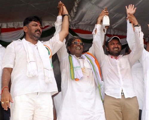 The ruling Congress in Karnataka today wrested the Bellary Rural seat from BJP and was ahead in another constituency as counting of votes for the prestigious by-polls held on August 21 was taken up this morning. DH photo