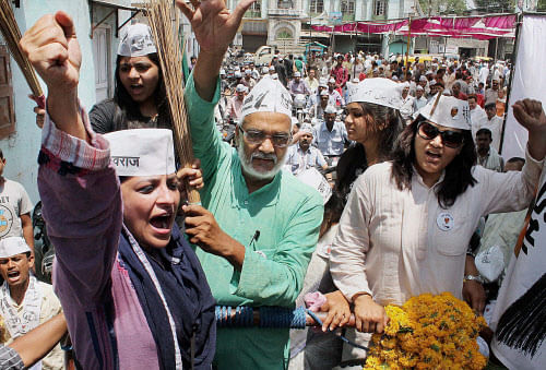 The Aam Aadmi Party today appeared to be on its way to recapture power in the national capital with the party leading in 54 constituencies against 12 of BJP and Congress's 1 seat. PTI file photo
