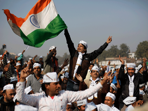 With early trends giving the party a massive lead over BJP, hundreds of AAP supporters broke into boisterous celebrations with their signature poll tune 'Paanch Saal Kejriwal' blaring over loudspeakers. AP file photo