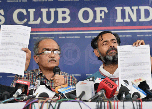 AAP leaders Yogendra Yadav and Prashant Bhushan at a press conference in New Delhi on Friday. PTI Photo