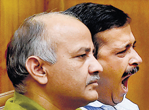 Delhi Chief Minister Arvind Kejriwal with his deputy Manish Sisodia during the Special session of the Delhi Assembly, on Tuesday. PTI