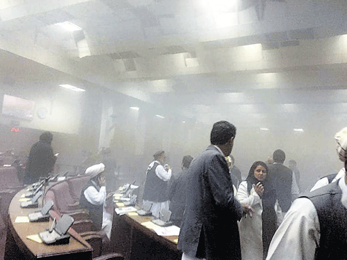Members of parliament were evacuated after an attack on the Afghan parliament building in Kabul, Afghanistan, on Monday. Reuters