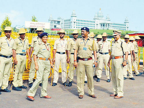 Geared up: Police personnel guard the Suvarna Vidhana Soudha in Belagavi, on the eve of the monsoon session of the legislature that begins on Monday.  DH PHOTO