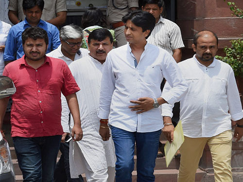 AAP members Sanjay Singh, Kumar Vishwas, Ashutosh and Dilip Pandey coming out of Union Home Ministry in New Delhi on Thursday. The AAP leaders complaineed to the home minister about the ruthless manner in which AAP volunteers were beaten up by the police outside the Anand Parbat police station during a protest recently. PTI Photo.