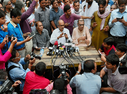 Former AAP leader Prashant Bhushan addressing the media during a protest over the arrest of Yogendra Yadav at Parliament Street Police Station in New Delhi on Tuesday.  PTI photo