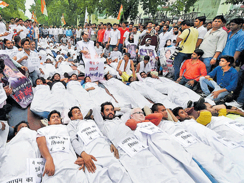 Demonstration: Youth Congress workers at a protest against the NDA government over Vyapam and other issues in New Delhi on Tuesday. pti
