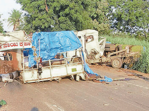 The mangled remains of a goods vehicle which an oil tanker rammed near Lokapur in Bagalkot district on Friday, killing 13 people on the spot. DH Photo