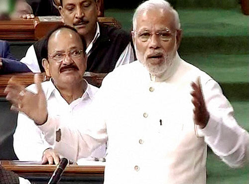 Prime Minister Narendra Modi speaks in Lok Sabha during the second day of winter session of Parliament in New Delhi on Friday. PTI Photo