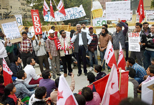 CPI leader D Raja addressing the All India Students' Association (AISA) members during their 'Occupy UGC' march against the government policies on higher education, in New Delhi on Wednesday. PTI Photo