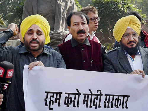 AAP leader  Bhagwant Mann and other member. PTI file photo