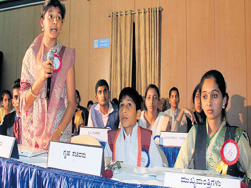 A students speaks at a youth parliment session in Bengaluru on Monday. DH photo