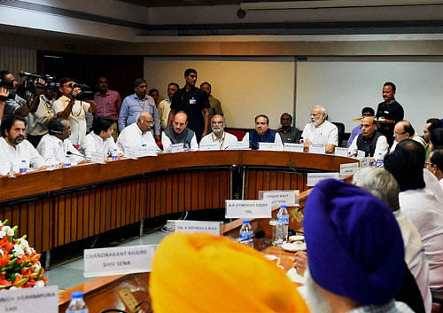 Prime Minister Narendra Modi, Home Minister Rajnath Singh, Finance Minister Arun Jaitley, Parliamentary Affairs Minister Anant Kumar, Congress leaders Mallikarjun Kharge, Ghulam Nabi Azad,Jyotiraditya Scindia and others party leaders at an all-party meeting ahead of the monsoon session, at Parliament House in New Delhi on Sunday. PTI Photo