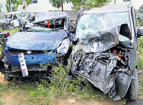 The mangled remains of the two cars that collided on Bengaluru-Mysuru Highway on July 17 , claiming three lives. DH FILE PHOTO