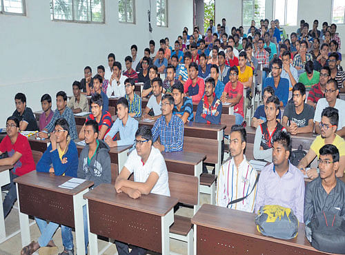 Students attend the orientation programme on the first day of the maiden academic year at the Indian Institute of Technology (IIT) in Dharwad on Monday. DH PHOTO