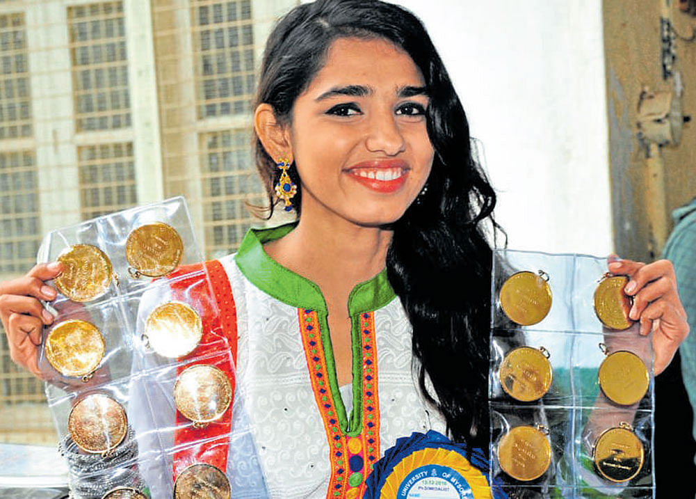 Neha Saron, who won the most gold medals at the 97th convocation of the University of Mysore on Tuesday. DH&#8200;photo