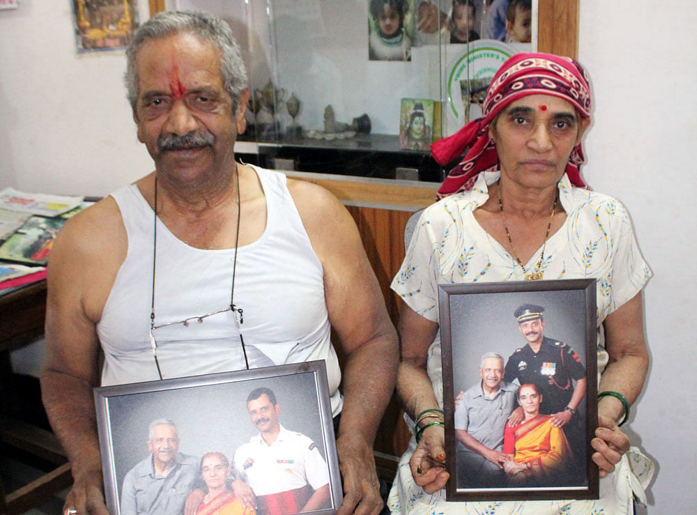 Sushila and Anant Kugaji, parents of Major Shrihari Kugaji, who survived an avalanche in Kashmir, at their house in Belagavi.