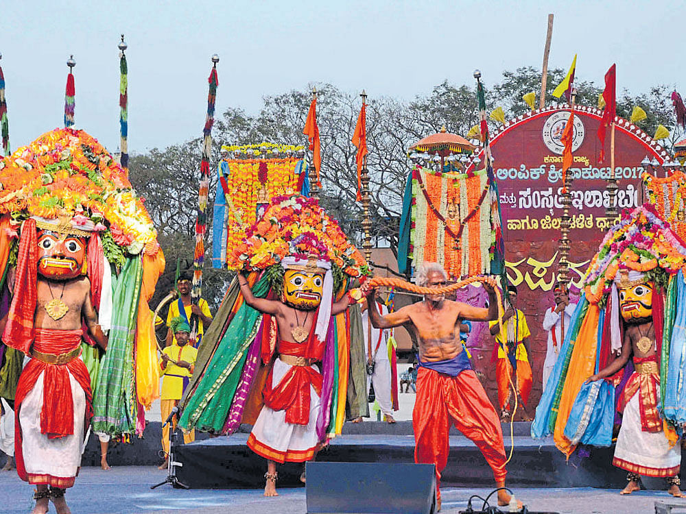 traditional touch: Folk artists perform during the opening ceremony of the State Games in Dharwad on Friday.
