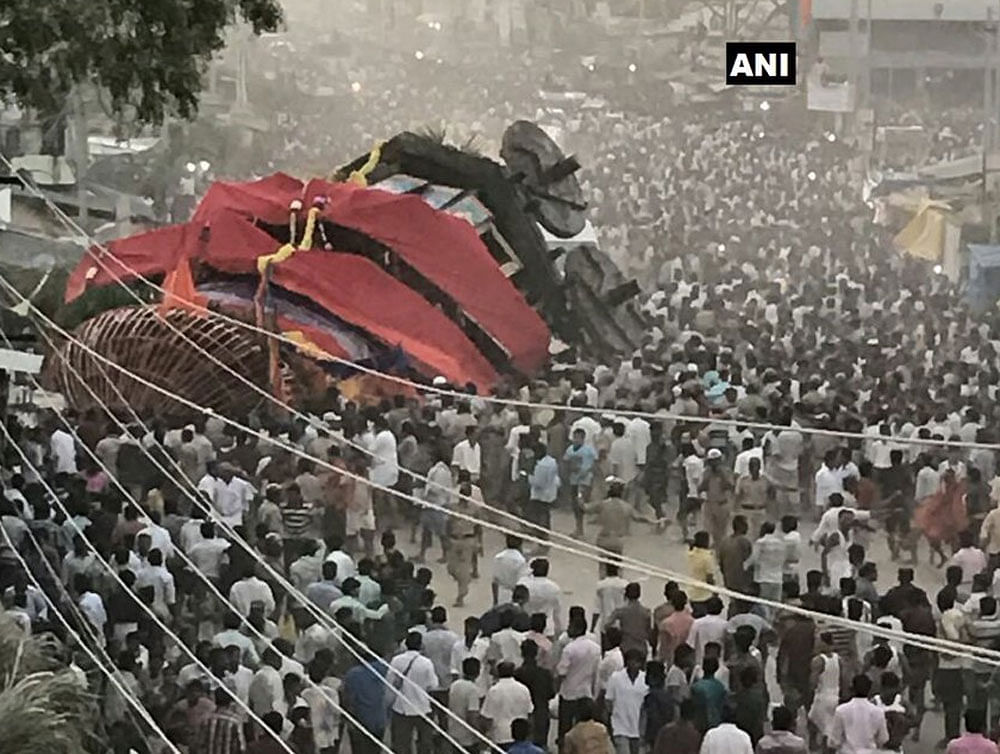 Breaking of wooden  wheels of the 60-feet tall chariot led to the mishap. Image courtesy: ANI/Twitter