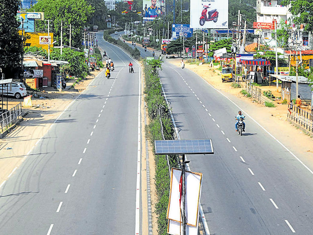 The existing NH 275 is not really a four-lane road as it does not meet the standards set by the Ministry of Road Transport and Highways. DH photo