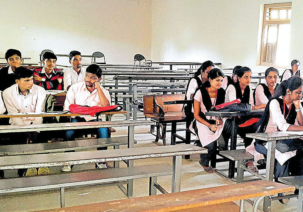 Second Year BCom students attending classes at IDSG College in Chikkamagaluru on Monday. Dh photo