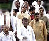 TV grab shows Opposition Members disrupt the proceedings in Lok Sabha over the recent Dantewada Maoist attack on Thursday. PTI