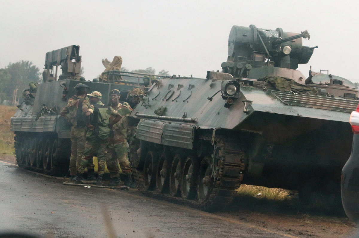 Military vehicles block road outside Zimbabwe parliament