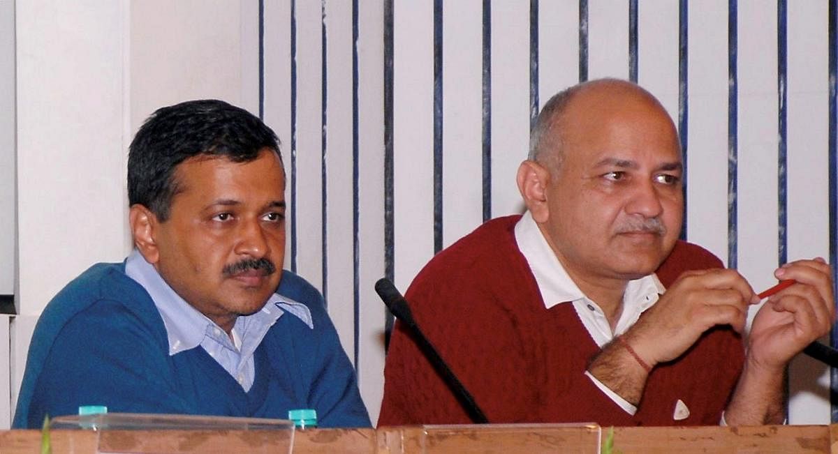 Delhi Chief Minister Arvind Kejriwal (left) with Deputy Chief Minister Manish Sisodia. PTI