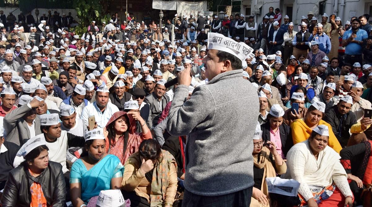 AAP leader Sanjay Singh addresses a party meeting on the sealing issue in New Delhi on Sunday.
