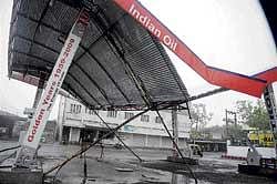 rain misery The roof of a petrol bunk in Gulbarga came crashing down due to rain and heavy winds on Friday. DH photo